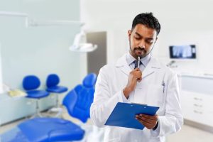 dental-office-manager-reviewing-patient-records-and-administrative-tasks-in-a-modern-dental-clinic